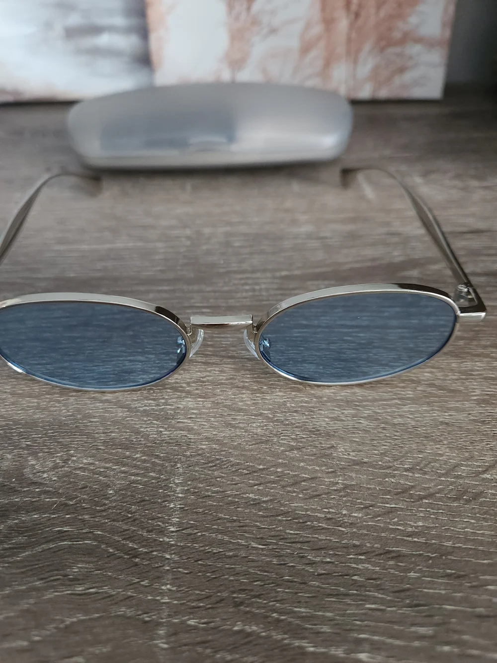 Oval Blue Lens Sunglasses with Silver Frame